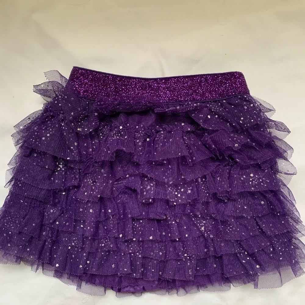 The Children’s Place purple sparkly ruffle skirt 6-9 months